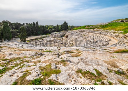 View to auditorium of the ancient Greek theatre (Teatro Greco) in Syracuse. Sicily, Italy Royalty-Free Stock Photo #1870365946