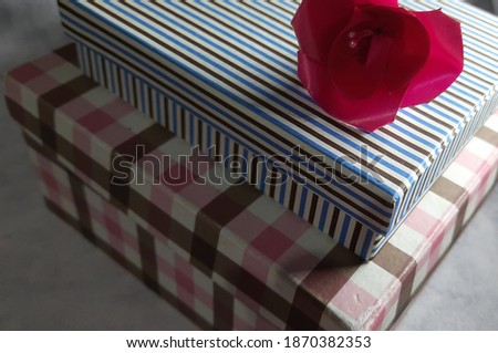 Two gift boxes isolated on white table