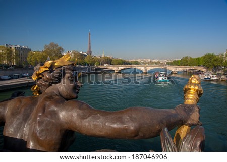 Alexandre III bridge in Paris against Eiffel Tower, France