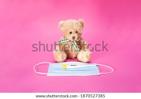 medical mask, thermometer, bear pink background