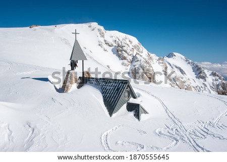 Landscape photography of the mountain hut Kredarica. Winter in Julian Alps, Slovenia.