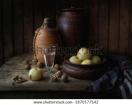 Rustic still life with pickled apples
