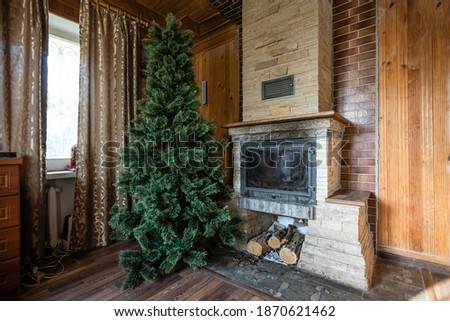 Christmas interior rustic, christmas tree in an old wooden house
