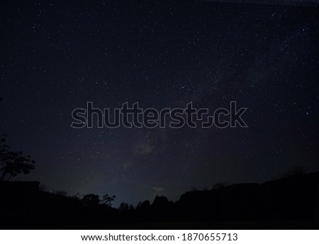 Background photo of stars on blue sky