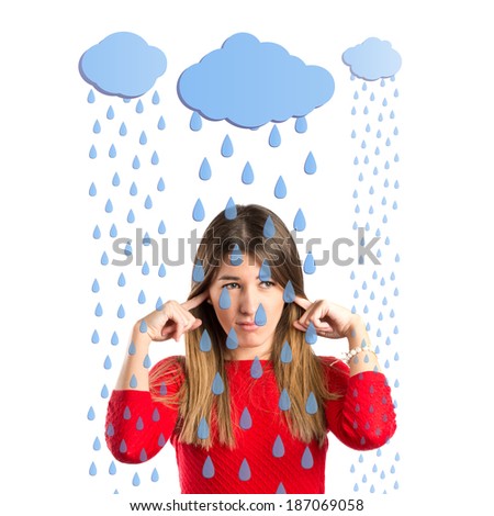 Cute girl covering her ears over sky background 