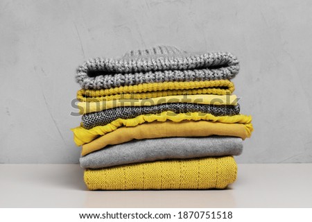Set of trendy yellow clothes, illuminating color