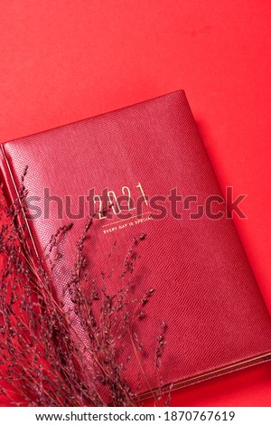 Red leather diary planner with 2021 year calendar