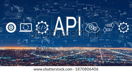 API - application programming interface concept with downtown Los Angeles at night