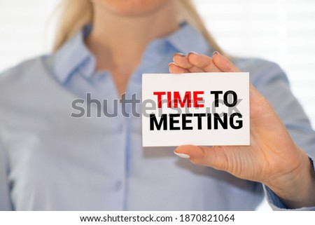 text TIME TO MEETING on white card