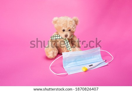 medical mask, thermometer, bear pink background