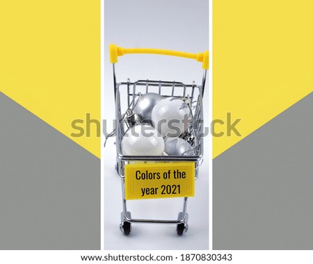 Shopping cart with christmas balls isolated on white background. Christmas concept.