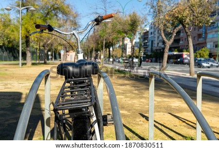 bicycle stopped at a bicycle spot in seville, spain
