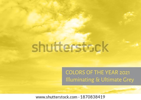 Light clouds in the yellow sky. Beautiful nature background. Concept of colors of 2021 year.