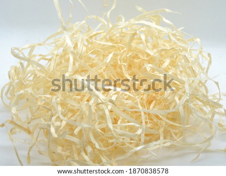 Paper nest made of pressed paper on a clear light background