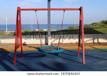 sports equipment and play equipment on the playground