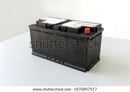 Old car battery type AGM That are deteriorated, waiting for proper storage Royalty-Free Stock Photo #1870847917