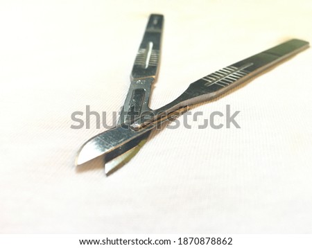 Scalpel is an essential dermatological tool used for making skin incisions, tissue dissections, and a variety of surgical approaches since the onset of ‘modern’ surgery. Selective focus image