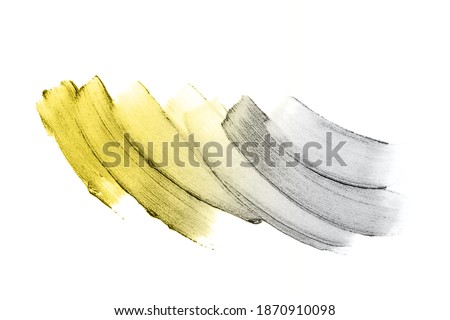 Demonstrating trendy colors 2021 - Gray and Yellow. Smear of cosmetics