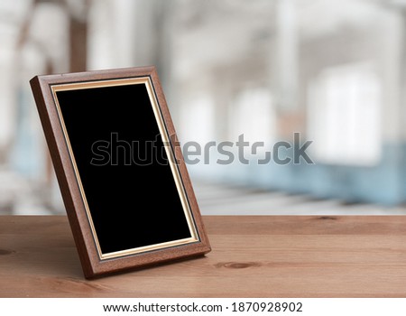 photo frame on the wooden table in the living room