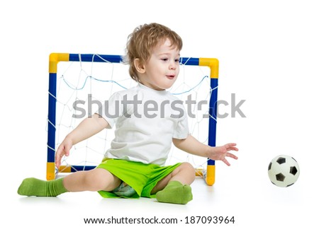 kid playing football and catching soccer ball