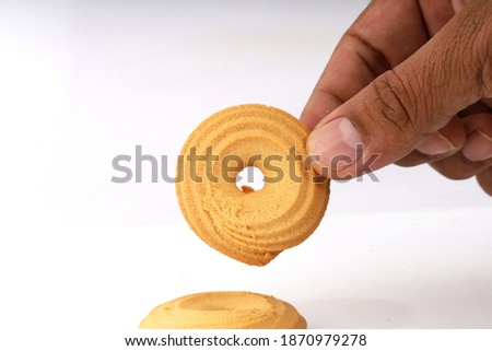 danish butter cookies in hand