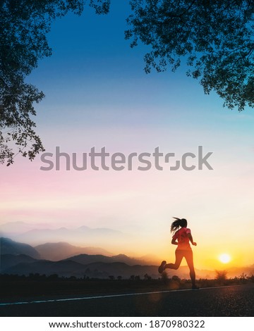 Young fitness Asian woman is running and jogging an outdoor workout on the road in the morning for lifestyle health. Royalty-Free Stock Photo #1870980322