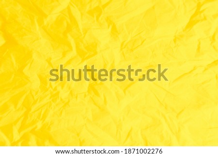 chill yellow pantone color of the year 2021 paper texture background.