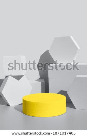 geometric shapes toned ultimate gray and an illuminating yellow podium display template for your project