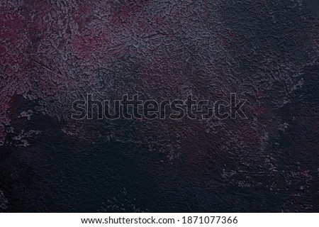 Photo of a hand-painted background texture in black and pink 