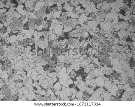 Carbon steel with Ferrite pearlite microstructure 200x Royalty-Free Stock Photo #1871117314