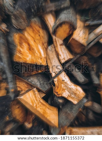 blurry photo of a pile of wood that gives the impression of aesthetic