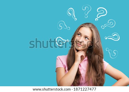 Thinking smile woman with questions marks on the background