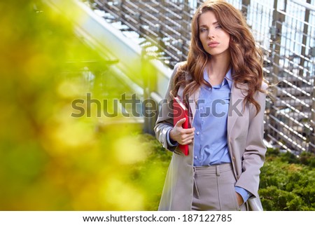 Businesswoman in spring garden