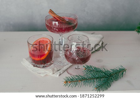Mulled wine Сhristmas holiday red beautiful festive moody dark  pictures with stylish decoration pine trees minimalism