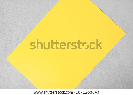 Abstract geometric paper and concrete textured background. Trendy yellow and gray colors 2021, active line.