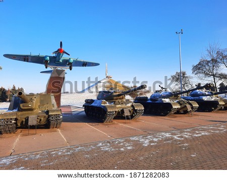 Exhibits of military equipment of the USSR against the background of the Mound of Glory