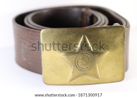 Soldier's leather belt with a badge from the time of the Soviet Union.