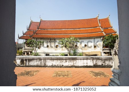 Beautiful old Buddhist temple in Thailand, blue sky.
