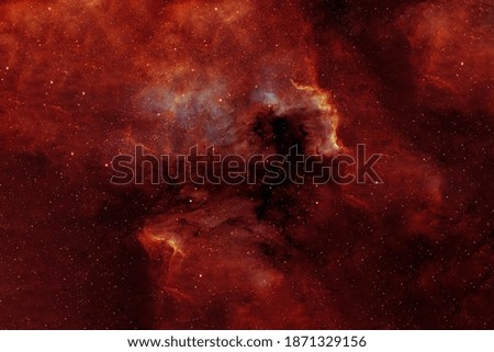 Red galaxy in deep space. Elements of this image were furnished by NASA.
