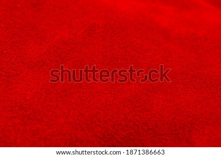 Red fabric texture. Background image. Selective focus