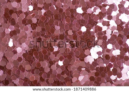Picture of shiny bright reflecting light sun pink color glitter textured background