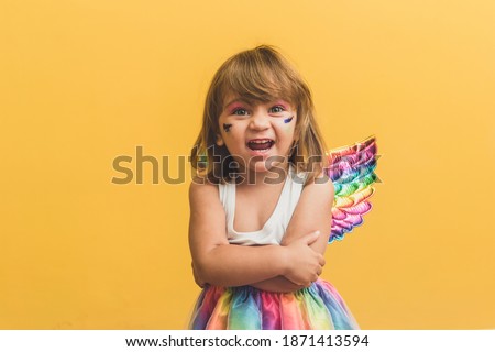 little little girl dressed for carnival.