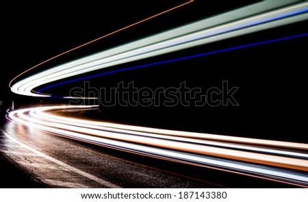 Truck light trails in tunnel. Art image . Long exposure photo taken in a tunnel . image with selecti