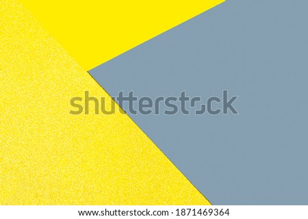 Abstract geometric paper background toned Illuminating and Ultimate Gray.