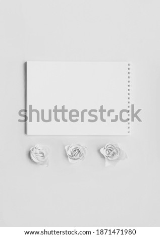 Festive concept with notebook and rosebuds on Gray background. Valentines Day. Template mock up of greeting card or text desi Colors of the year 2021- Graygn.
