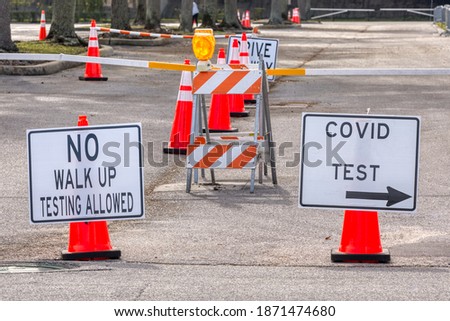 Cocid testing sign at a site in Florida.