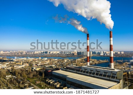 Garbage incineration plant. Waste incinerator plant with smoking smokestack. The problem of environmental pollution by factories aerial view Royalty-Free Stock Photo #1871481727