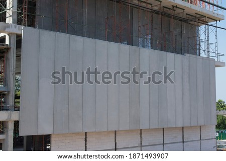 Precast concrete walls on building structures. Precast concrete manufactory product for construction industrial. Concrete wall panel. Building construction.