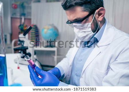 Health care researchers working in medicals science technology research in laboratory