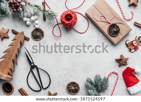 A top view of Christmas decorations on a white background